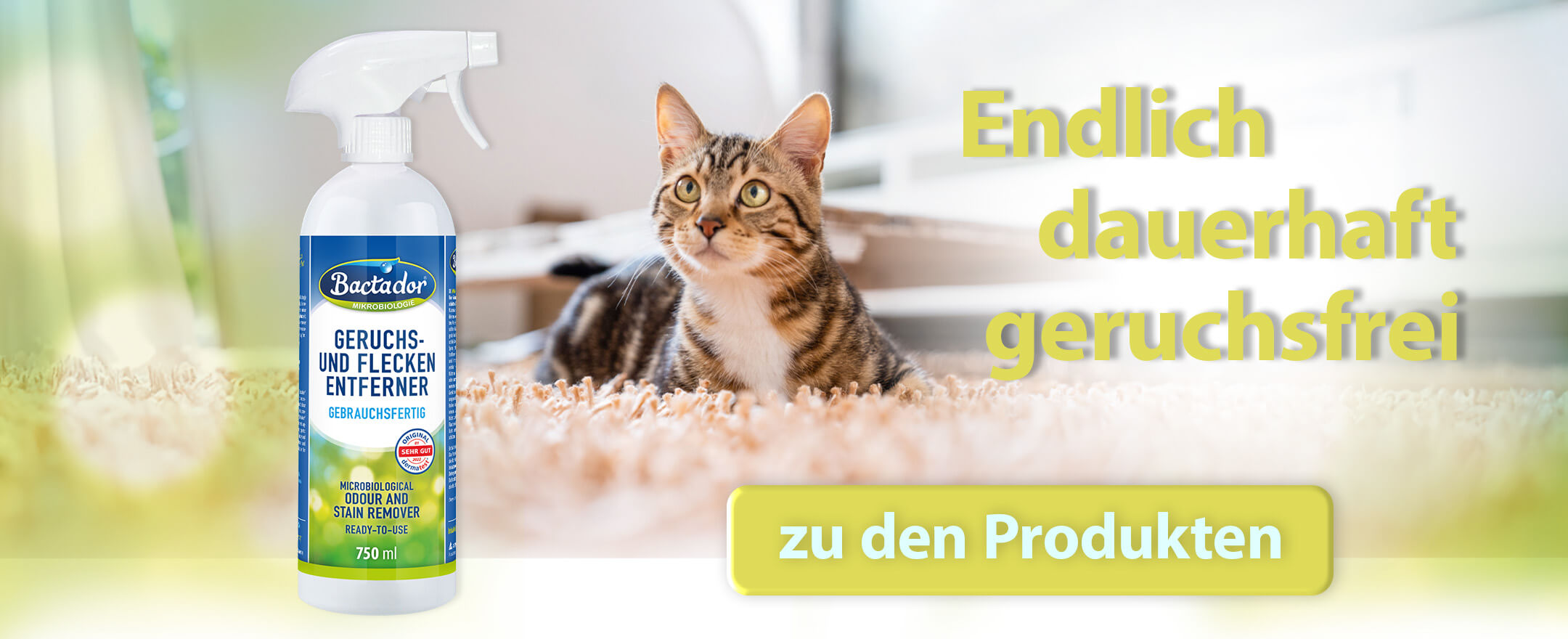 Katze liegt auf Teppich und schaut hoch - Bactador Flasche steht vorm Bild - Button Text zu den Produkten - Text Endlich dauerhaft geruchsfrei